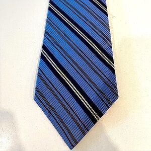 Robert Talbott Tie. Blue/black/red/white diagonal stripes. 100% silk. Hand made
